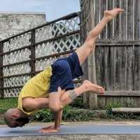 Yoga pose one-footed crow
